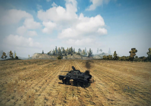 ruski tank samotnie stygnie na polu